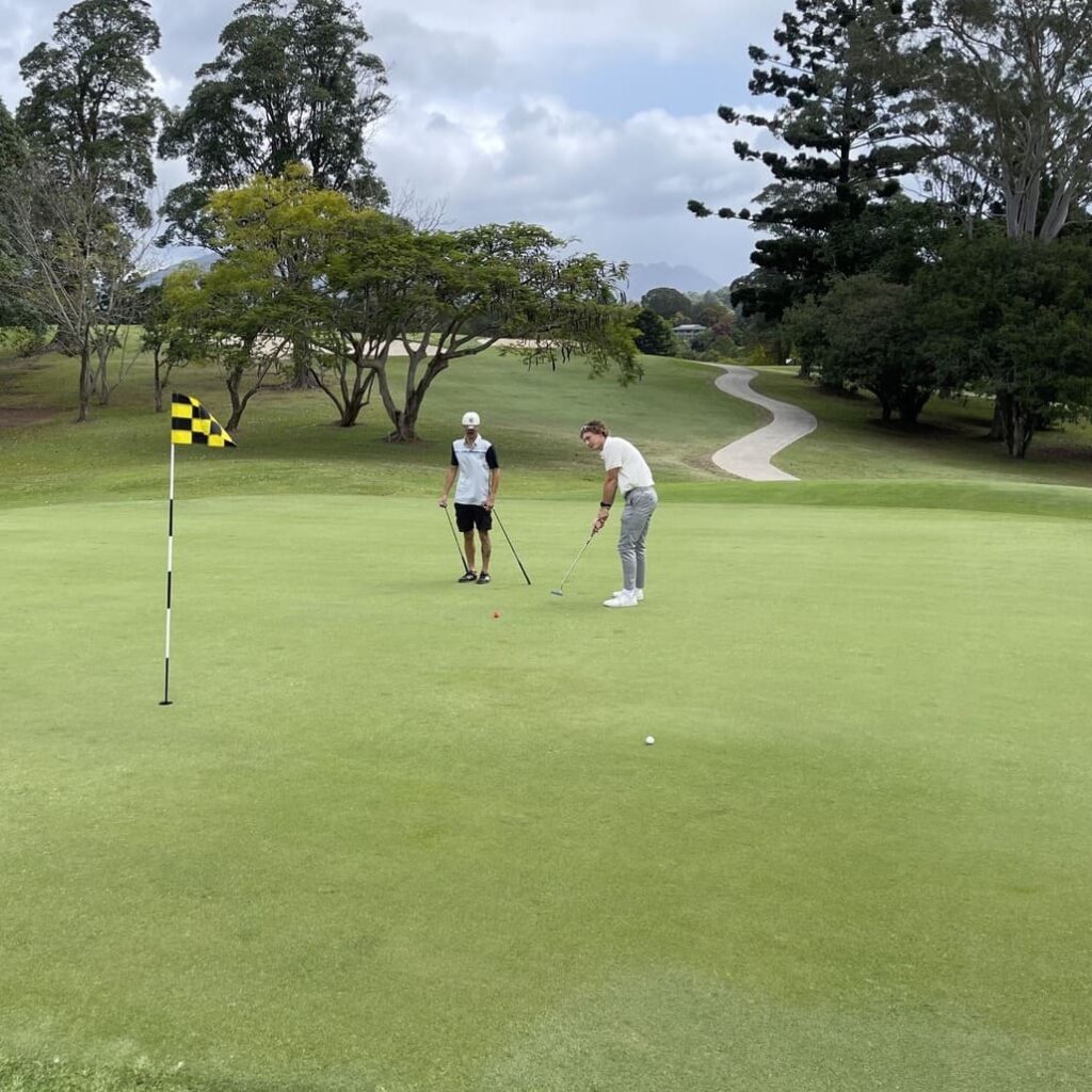 man golfing